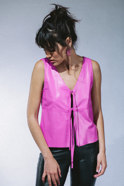 CHALECO BENITA FUCSIA